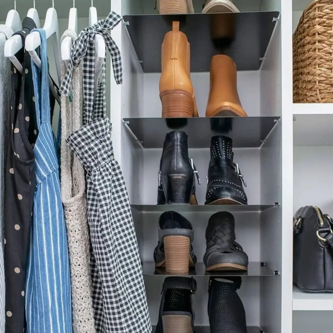 Custom reach-in closet with boot rack and hanging storage in Auburn Alabama